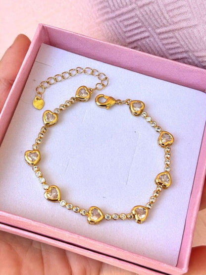 Pulsera corazones dorada