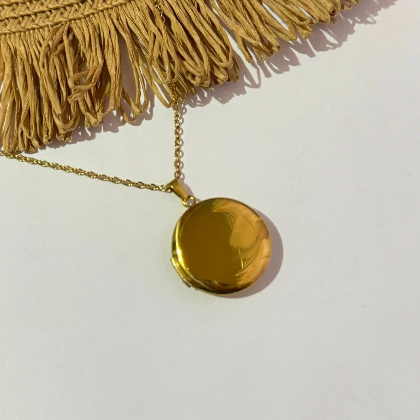 Relicario circular (grabados)